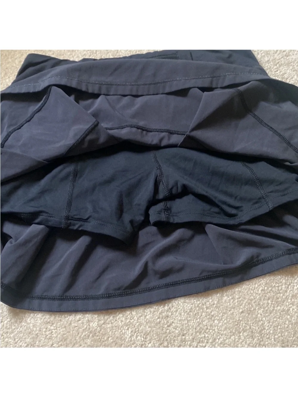 Lululemon black Athletic skirt with built-in biker shorts. Size 4